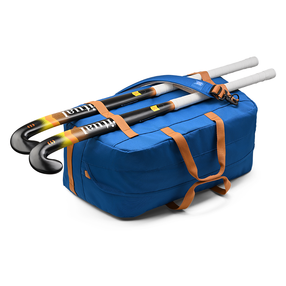 Ritual Calibre hockey duffle bag blue with multiple hockey sticks