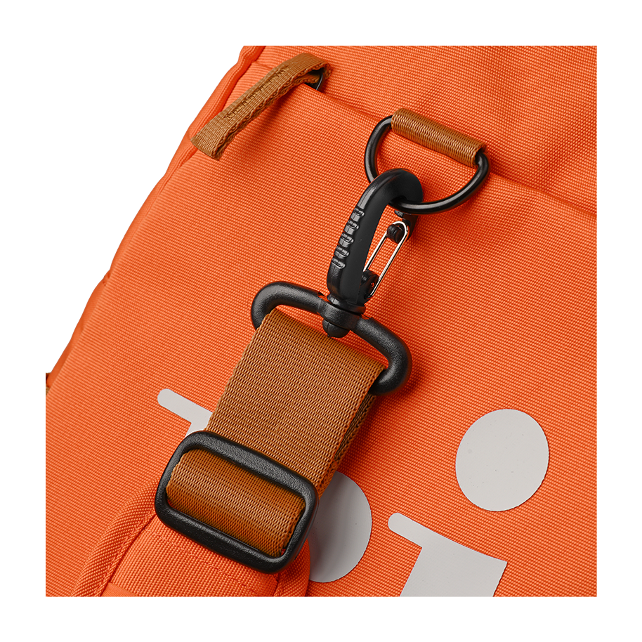 Ritual Calibre hockey duffle bag orange with brown straps and black hardware