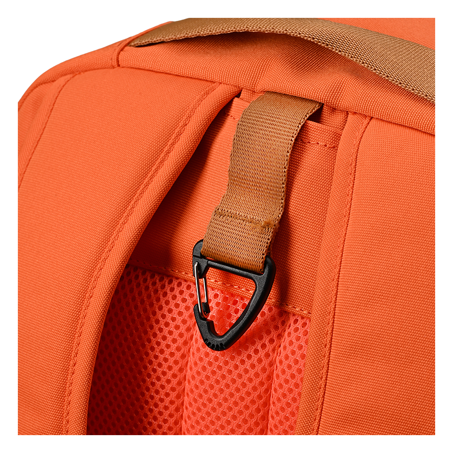 Ritual Covert hockey backpack orange with a brown strap and black carabiner.