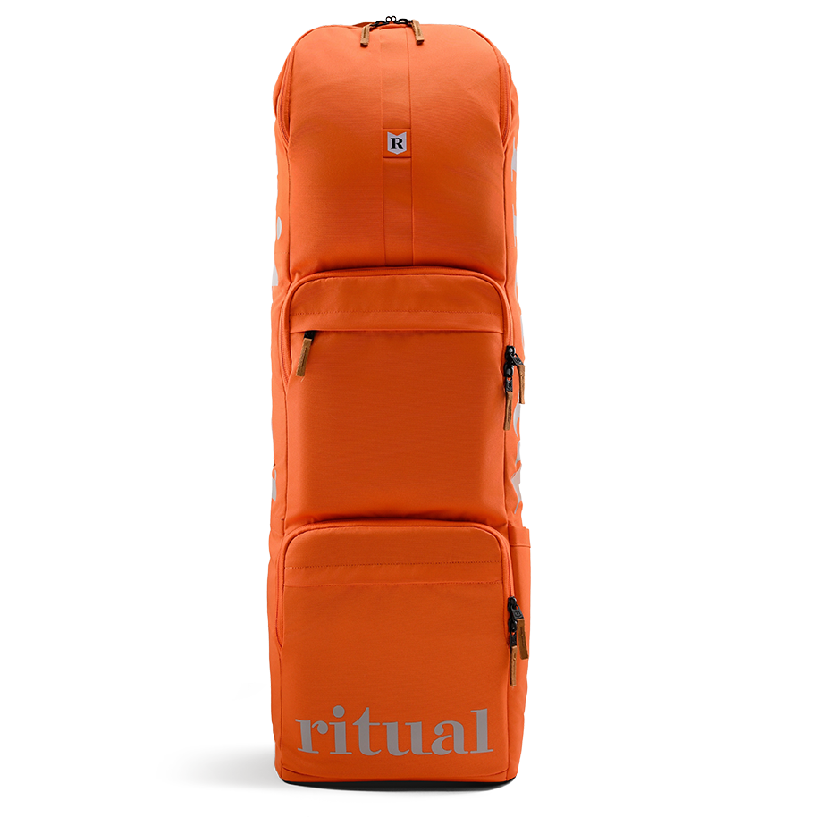 Ritual Hockey orange combo stick bag with silver logo, front view