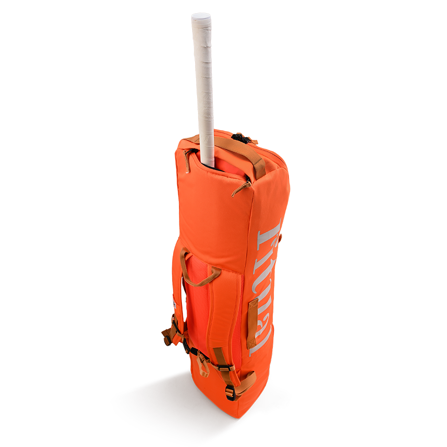 Ritual Hockey orange tactic stick bag with a stick white handle, backview