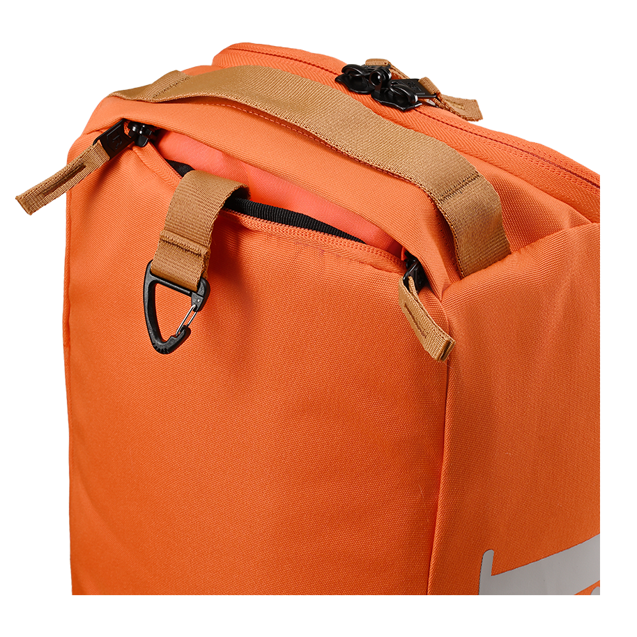 Ritual Hockey orange tactic stick bag with brown straps, close-up view